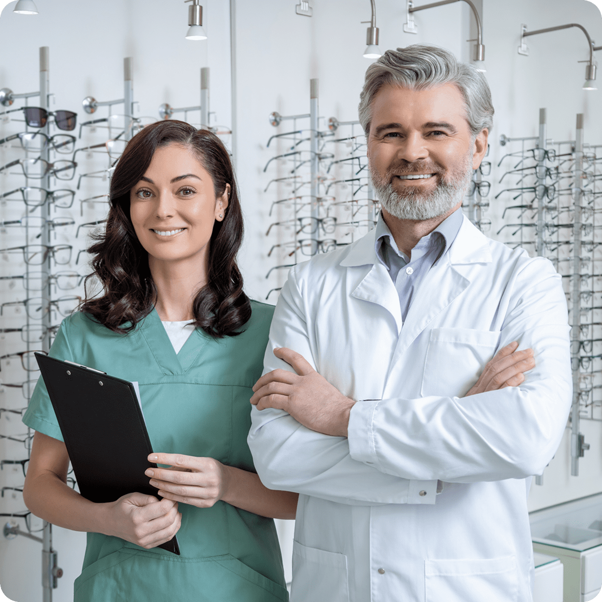 Optometrists standing in eyewear store.
